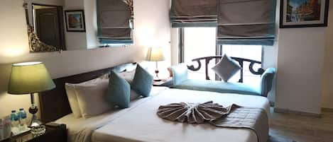 Chambre Deluxe | 3 chambres, fer et planche Ă repasser, Wi-Fi gratuit