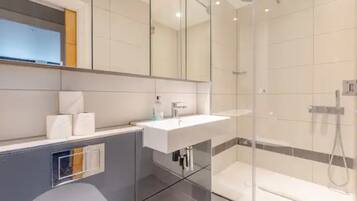 Basic Apartment, 1 King Bed with Sofa bed | Bathroom | Shower, hair dryer, towels, soap
