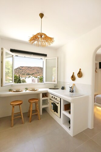 A privately owned home adorned in the distinctive, traditional Cycladic style.