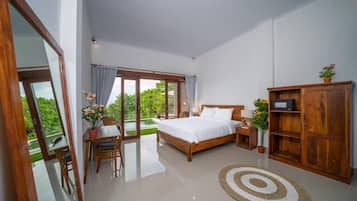 Deluxe Room, 1 Bedroom, Pool View | 1 bedroom, minibar, desk, laptop workspace