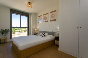 2 habitaciones, tabla de planchar con plancha y cuna de viaje 