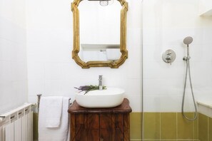 Shower, eco-friendly toiletries, hair dryer, bidet