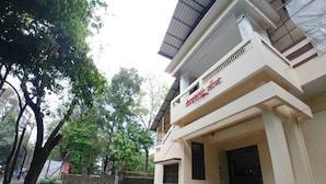 A building with a sign that reads "Hotel". - Hotel Matruchhaya Lonavala (Mawal)