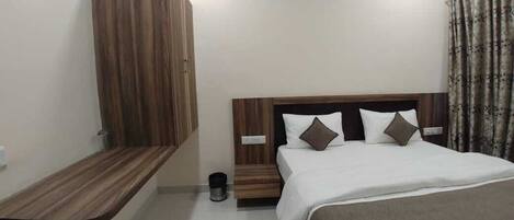 Deluxe Room | Egyptian cotton sheets, premium bedding, memory foam beds