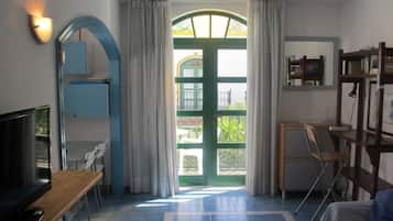 1 dormitorio, tabla de planchar con plancha, Internet y ropa de cama