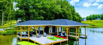 250’ of Lakefront with Boat House & Private Beach
