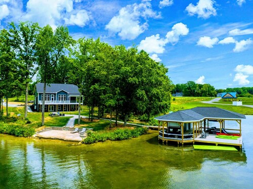 250’ of Lakefront with Boat House & Private Beach