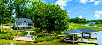 250’ of Lakefront with Boat House & Private Beach