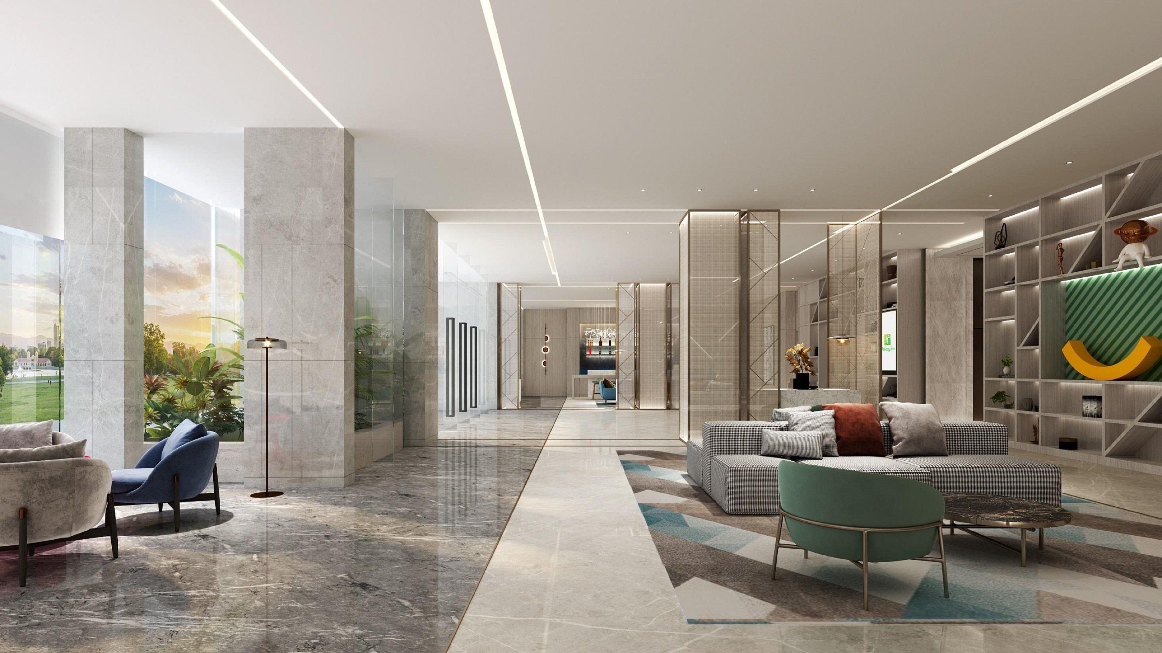 A modern lobby with a marble floor, seating area, and a view of the outdoors.
