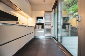 Fridge, microwave, oven, stovetop - One & Only Lake View Penthouse no01 (Melide)