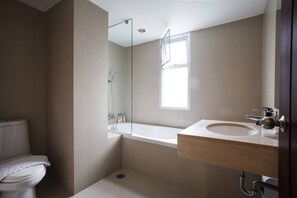 Bathtub, hair dryer, towels