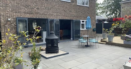 Spacious, modern family home. Open and airy in summer, cosy log fire in winter.