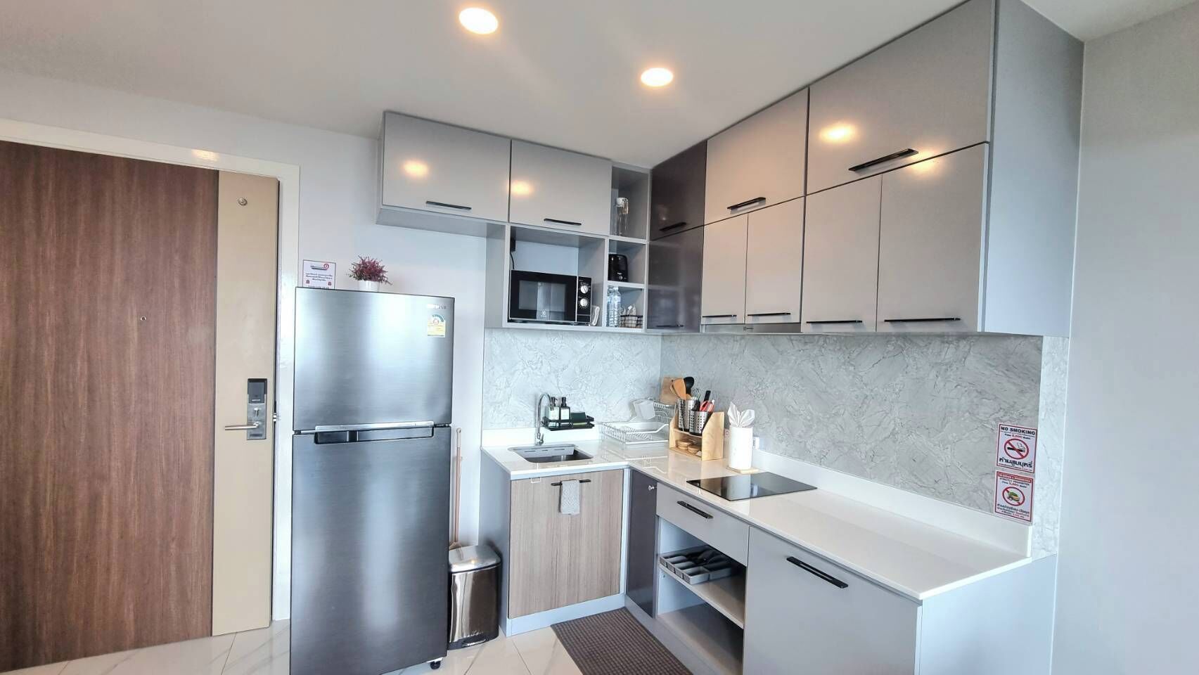 Fridge, microwave, stovetop, coffee/tea maker