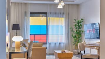 Standard Apartment | Living area | 105-cm Smart TV with digital channels, Netflix, first-run movies