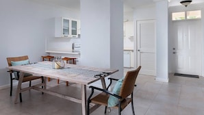 A dining area with a long table, four chairs, and a white cabinet above. - Vuemont #245 - by ZenBreak (Mount Brevitor)