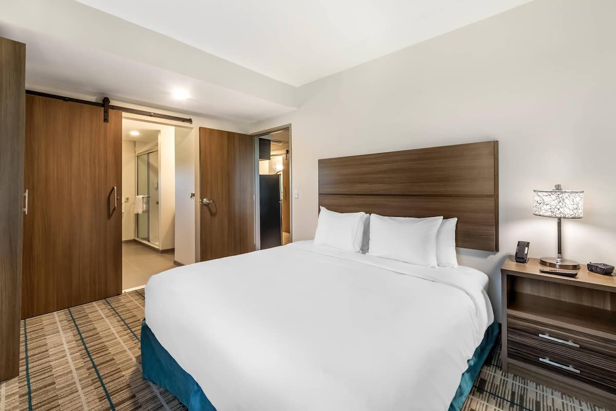 1 bedroom, laptop workspace, blackout drapes, iron/ironing board