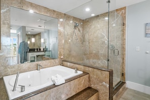 Jetted tub, eco-friendly toiletries, hair dryer, bidet