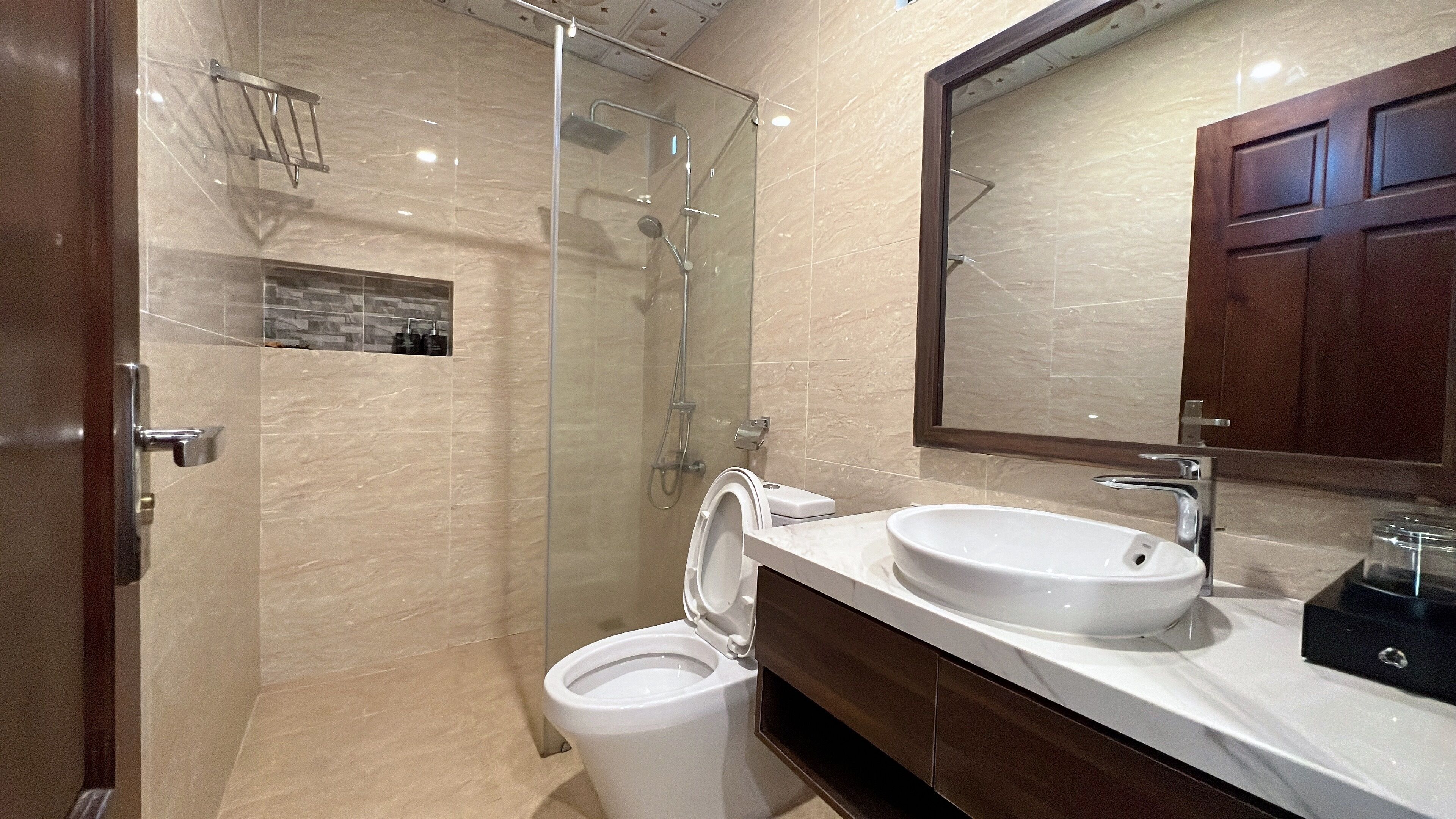 deluxe bungalow | bathroom | shower, hydromassage showerhead, designer toiletries, hair dryer