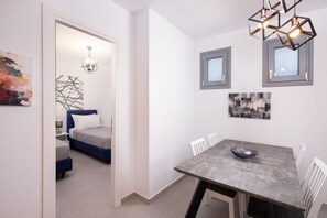 Economy Apartment, Private Bathroom | Living area | 55-inch Smart TV with digital channels, Netflix, streaming services - Hosting Moments Semi Basement Apartment (Mykonos)