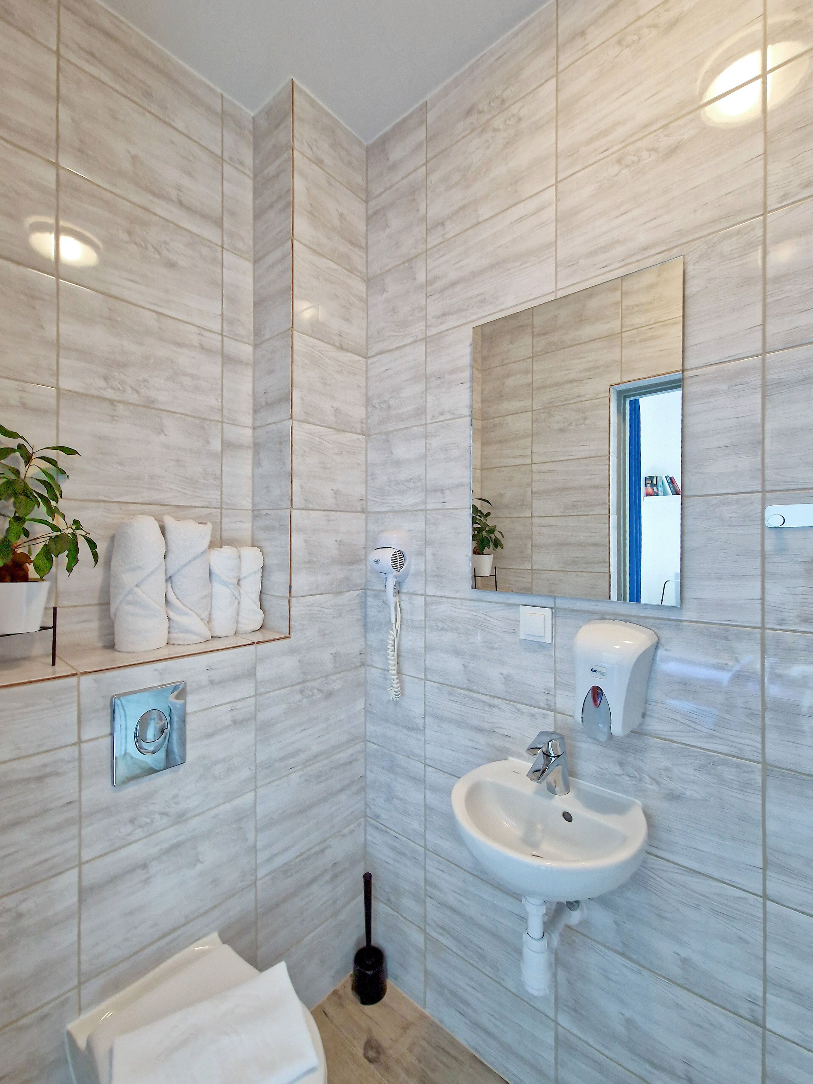 standard double room | bathroom | shower, rainfall showerhead, hair dryer, heated floors