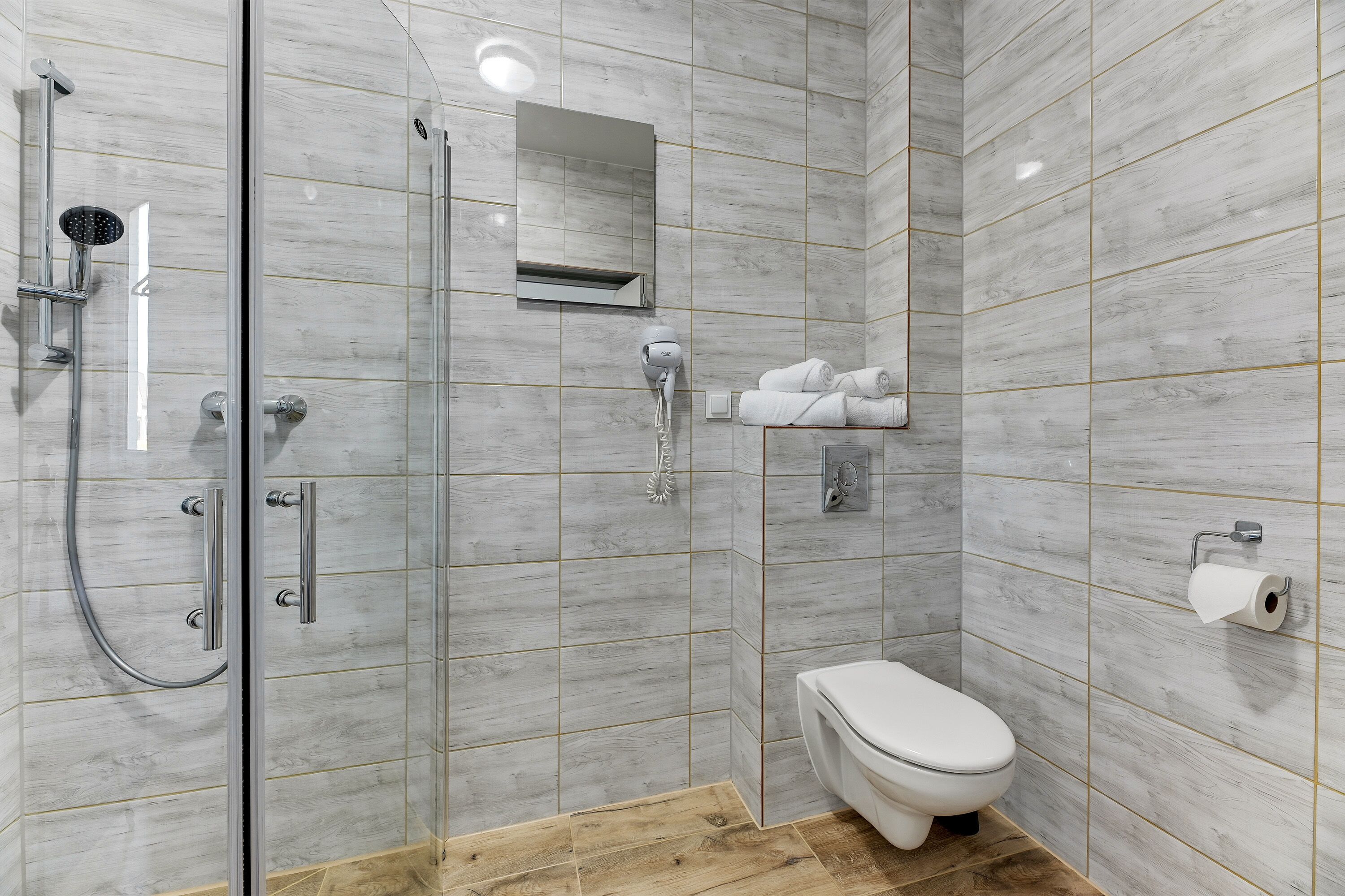 standard double room | bathroom | shower, rainfall showerhead, hair dryer, heated floors