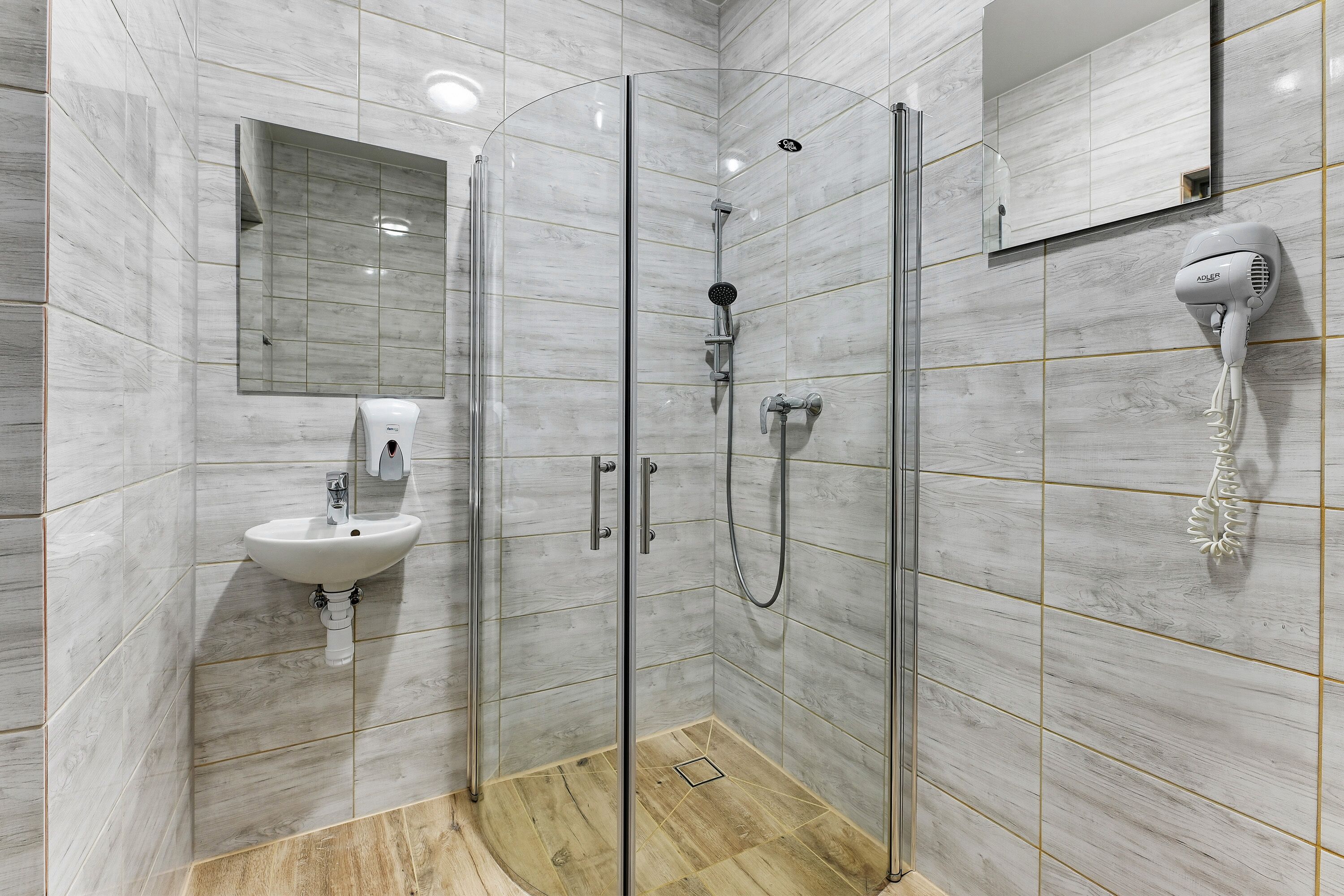 standard double room | bathroom | shower, rainfall showerhead, hair dryer, heated floors