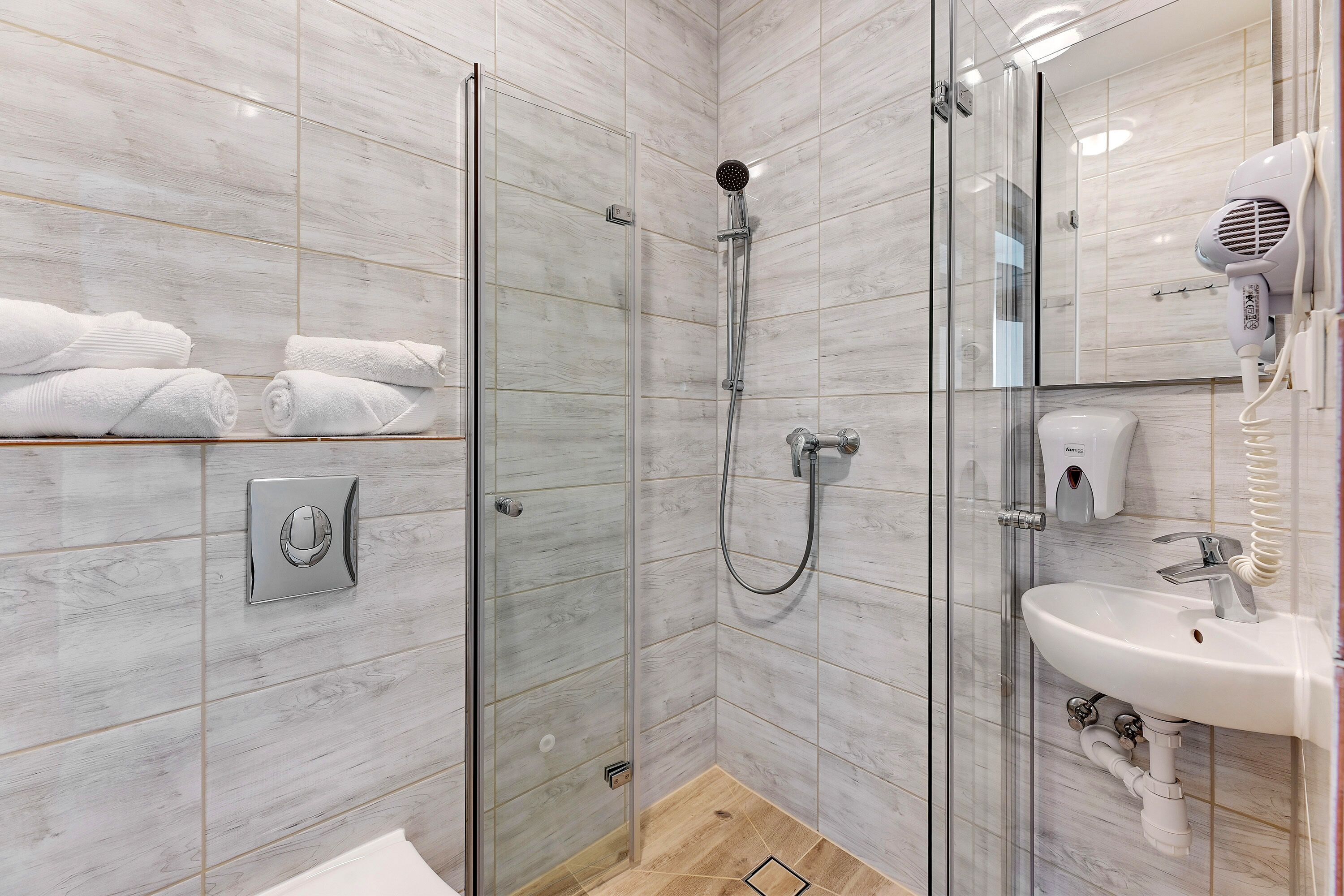 standard double room | bathroom | shower, rainfall showerhead, hair dryer, heated floors