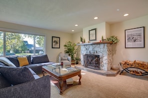 House (4 Bedrooms) | Living area | Fireplace, books - Charming Anchorage Home w/ Private Hot Tub! (Anchorage)