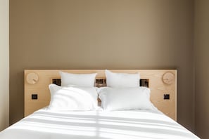 Hypo-allergenic bedding, desk, blackout drapes, iron/ironing board