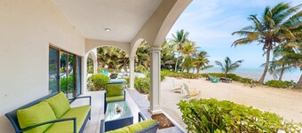 Ground-floor ocean-view condo with dock, pool, full kitchen, & AC