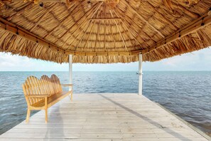 Terrace/patio - Ground-floor ocean-view condo with dock, pool, full kitchen, & AC (San Pedro)