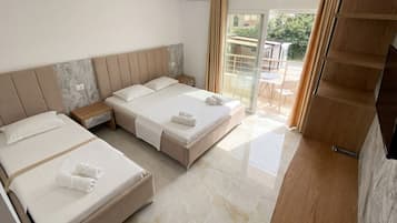 Deluxe Triple Room, Balcony | Premium bedding, memory foam beds, individually decorated