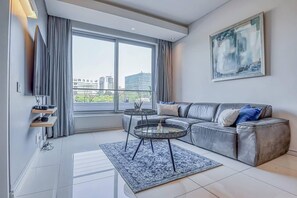 Apartment | Wohnbereich | Fernseher