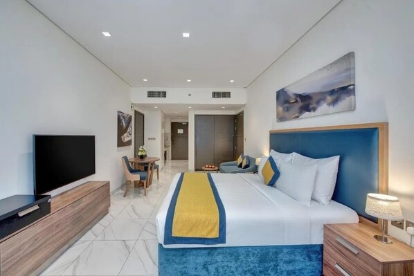 1 bedroom, iron/ironing board, WiFi, bed sheets - Studio Apartment Near Sharaf Dg Metro By E R (Dubai)