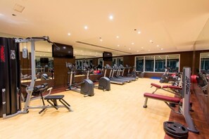 Stay fit on the go with our fully equipped gym featuring treadmills, elliptical trainers, and weightlifting equipment.