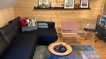 Apartment | Living area | TV, fireplace