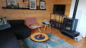 Apartment | Living area | TV, fireplace