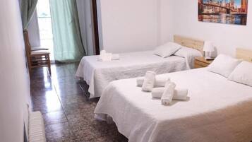 Comfort Triple Room | Down comforters, memory foam beds, individually decorated