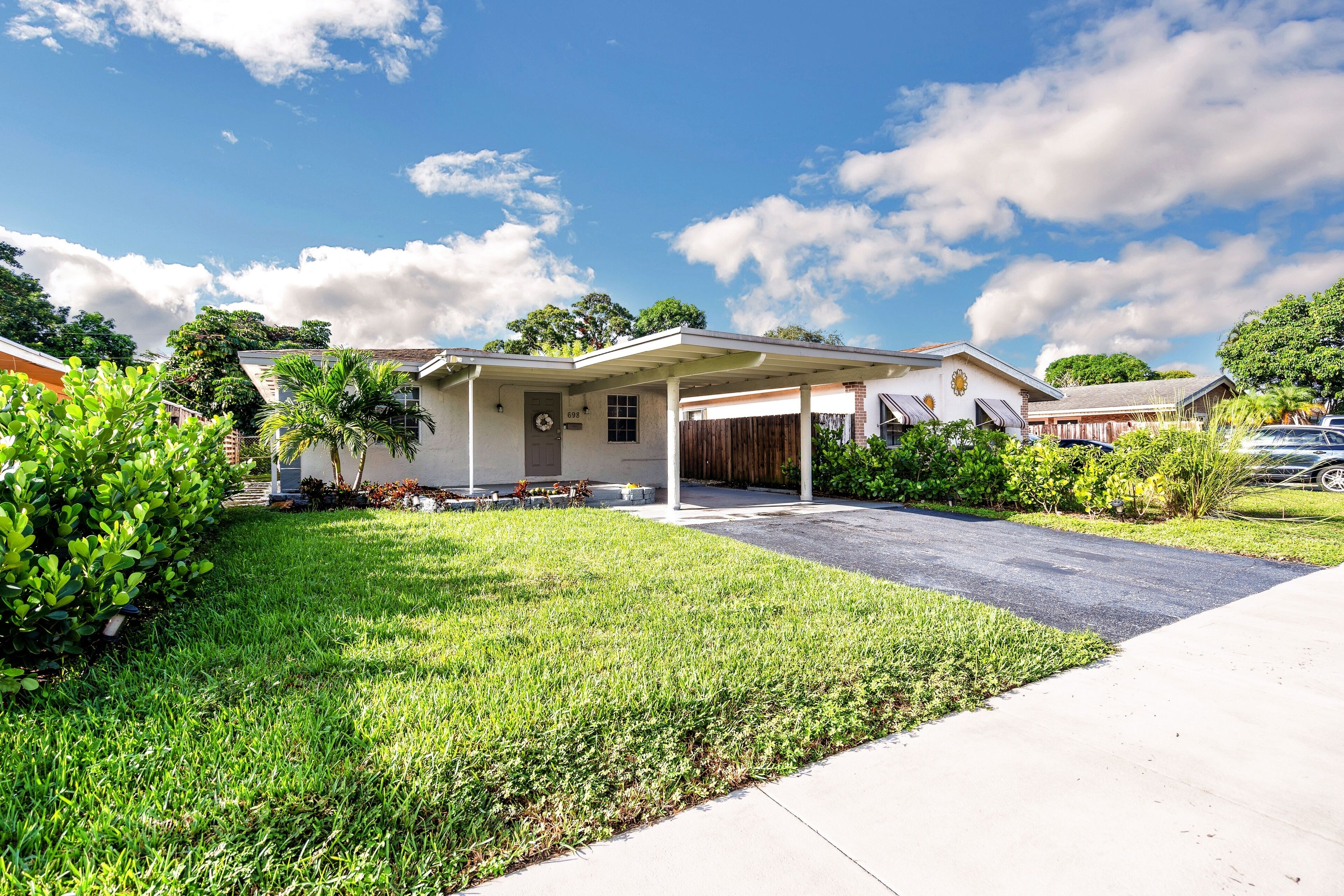 Tropical Oasis Retreat in Oakland Park, FL by RedAwning