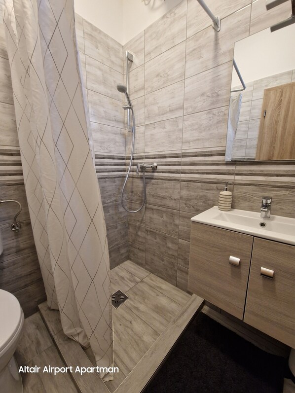 Hair dryer, towels, soap, toilet paper