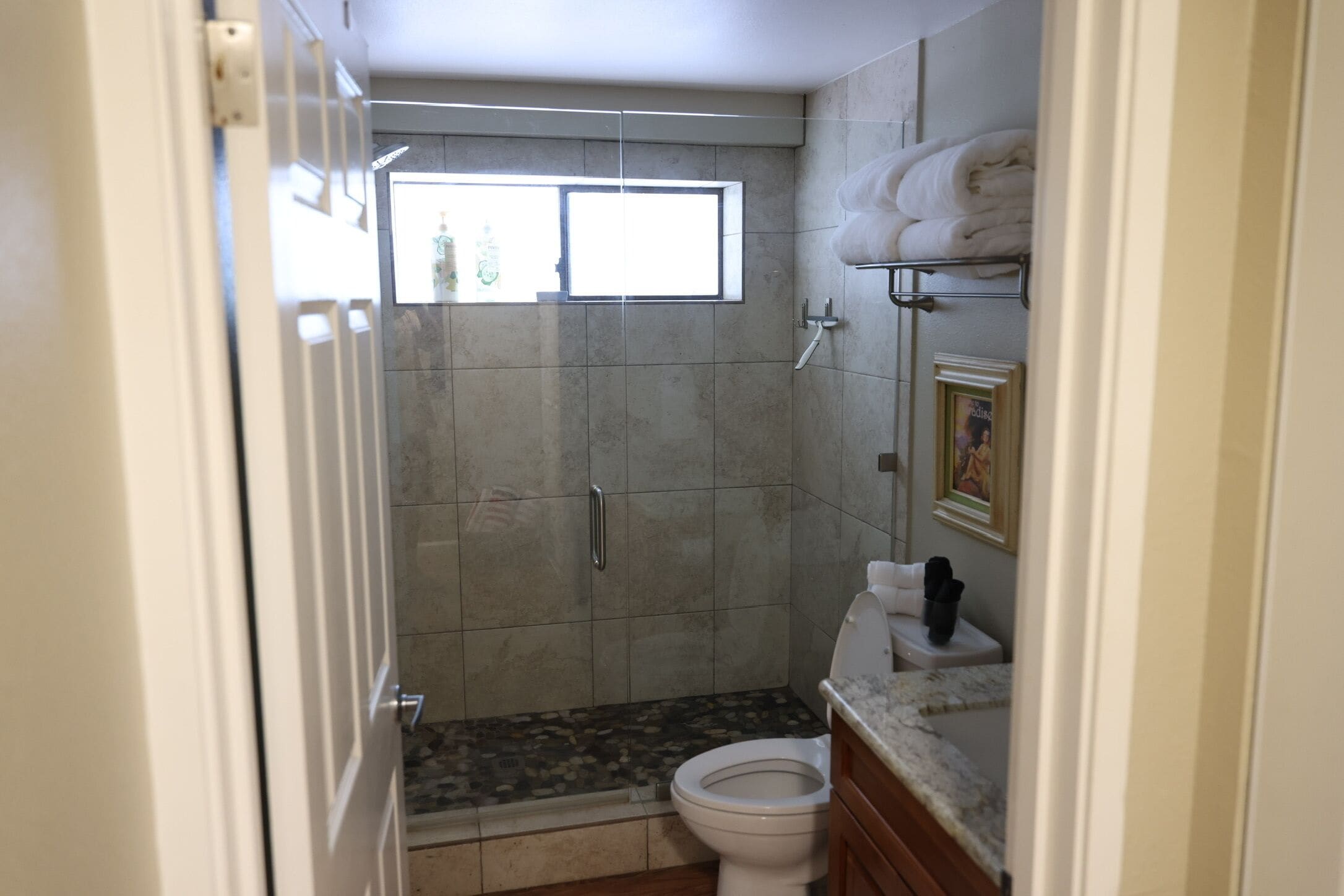 Shower, hair dryer, towels, soap