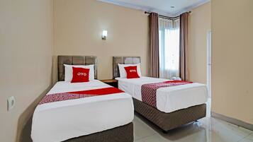 Kamar Twin Deluks | 1 kamar tidur, meja kerja, Wi-Fi gratis, dan seprai linen