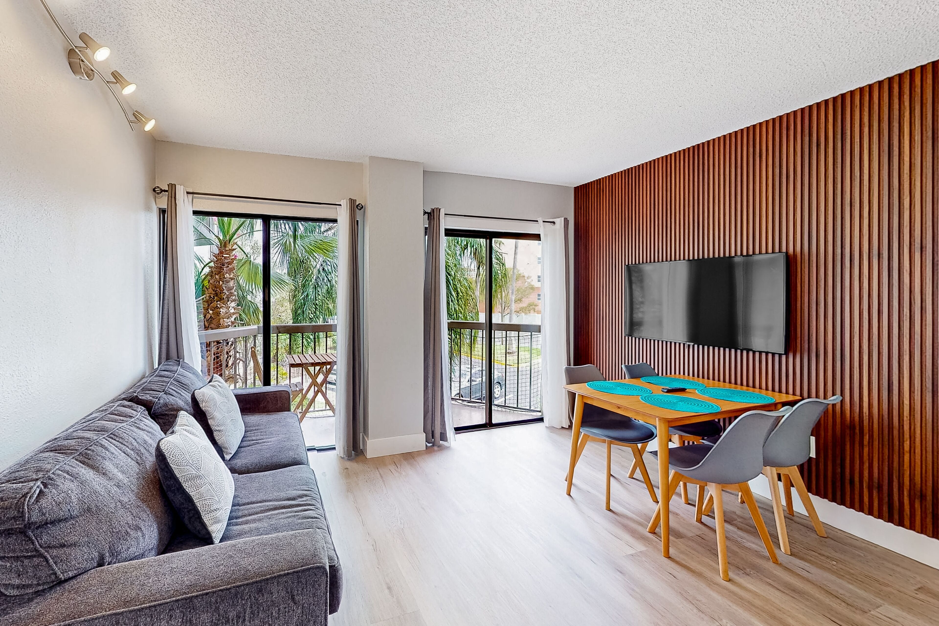 Charming sunlit condo with pool, hot tub, balcony, & game room - close to parks