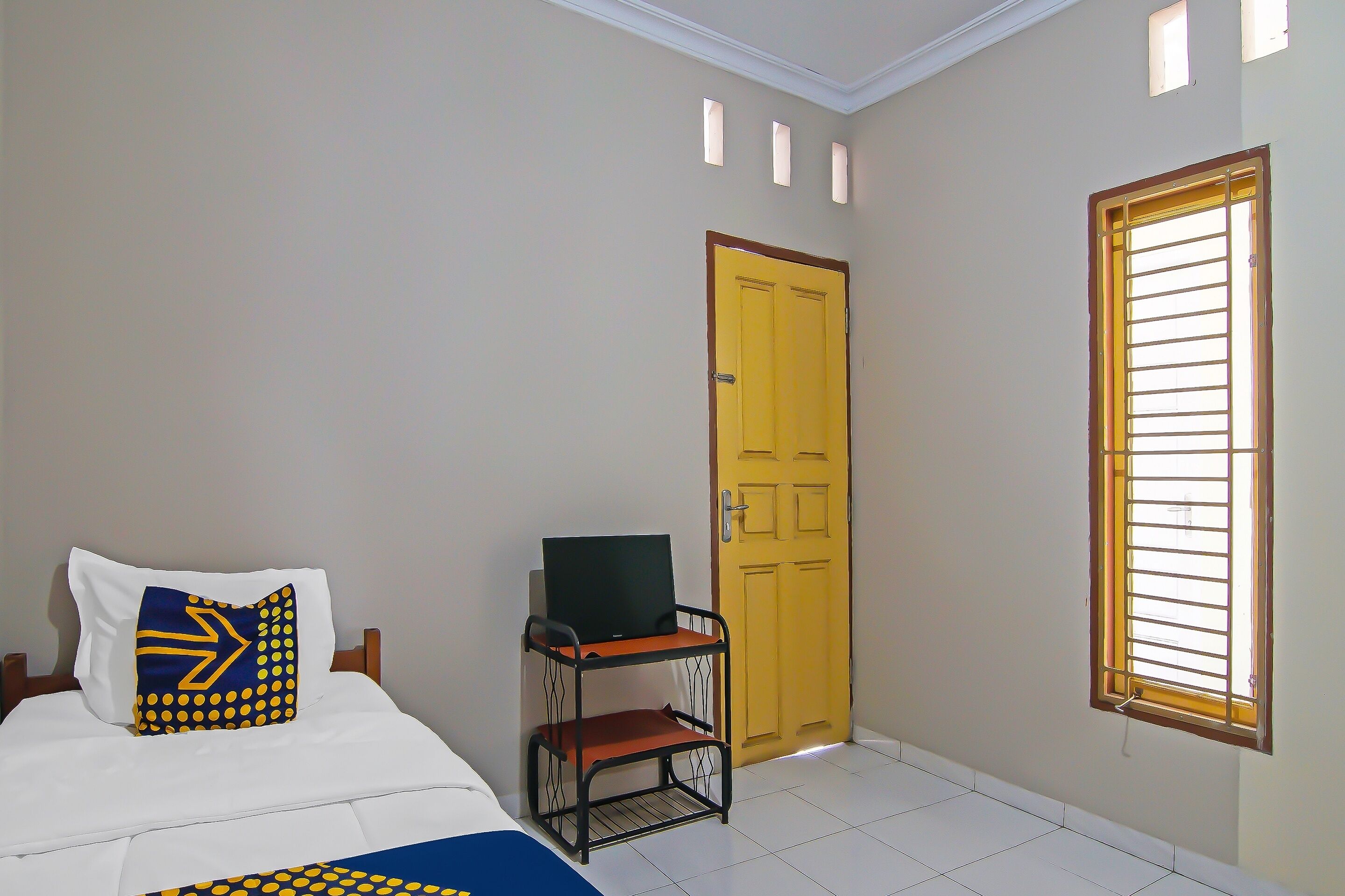 Foto - Hotel O Flamboyan 25 Homestay Syariah