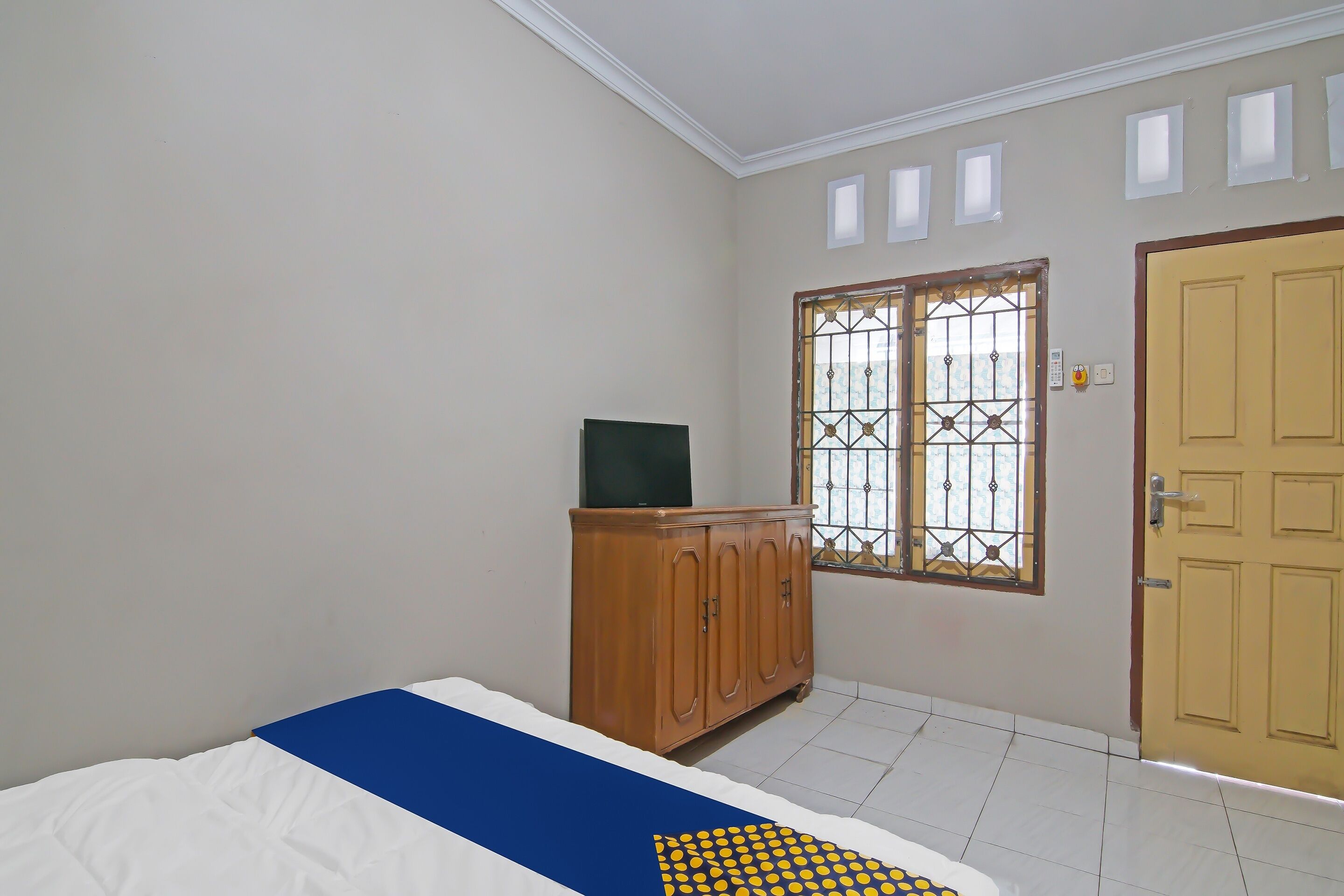 Foto - Hotel O Flamboyan 25 Homestay Syariah