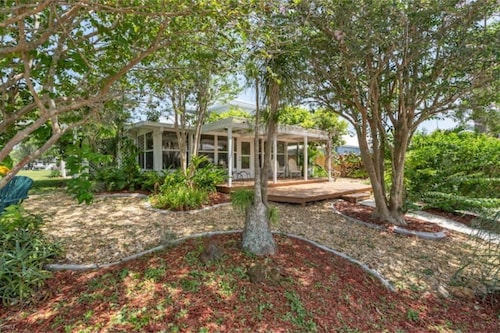 Long-Term Discount!Unique 3BR canal home, Private Dock, Boat Lift, Deck!
