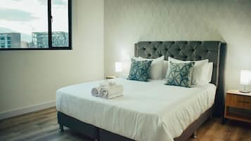 2 habitaciones, tabla de planchar con plancha, cuna de viaje y wifi