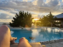 Outdoor pool, pool umbrellas, sun loungers