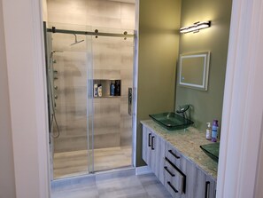 Shower, towels, soap, shampoo