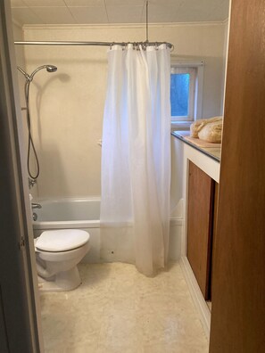 Hair dryer, towels, soap, shampoo